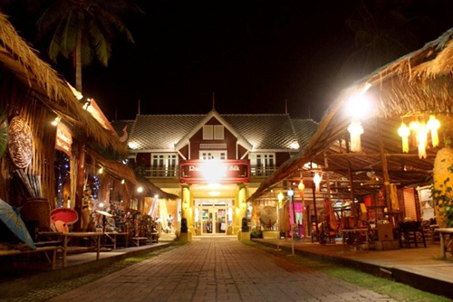 Mike & Co Tailor Shop — Garden Campus at Night