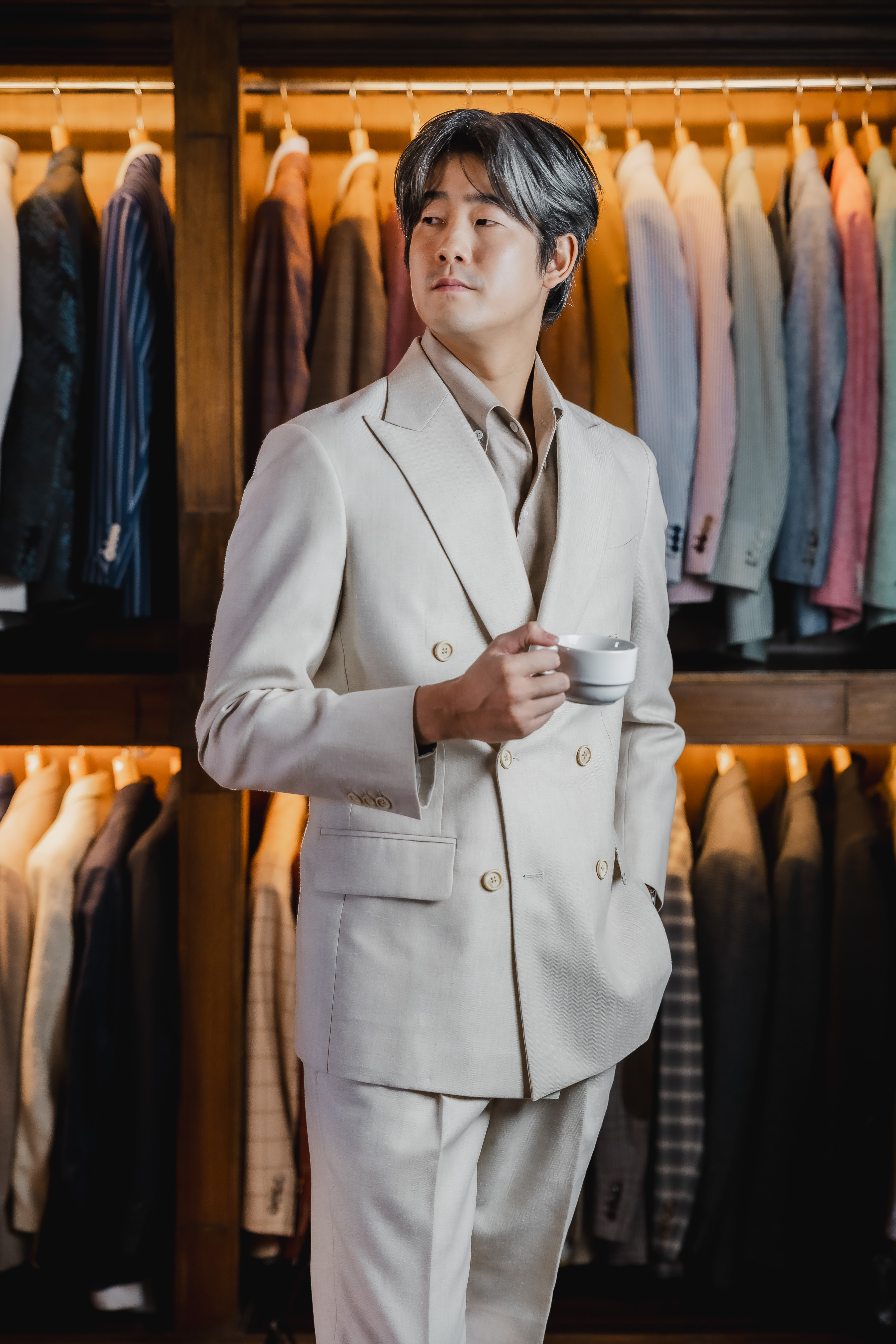 Cream double-breasted suit standing